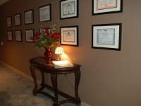 Stock Certificates in Hallway Outside My Office