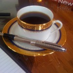 Gold Rimmed Coffee Cup and Saucer with Montblanc Fountain Pen