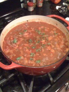 Gourmet Chili with Red Wine The gourmet chili with red wine recipe cost between $65 and $75 in ingredients alone, but it doesn't need to be that expensive. The red wine added a great flavor and the peppers caused a slow, burning aftertaste that was quite satisfying.