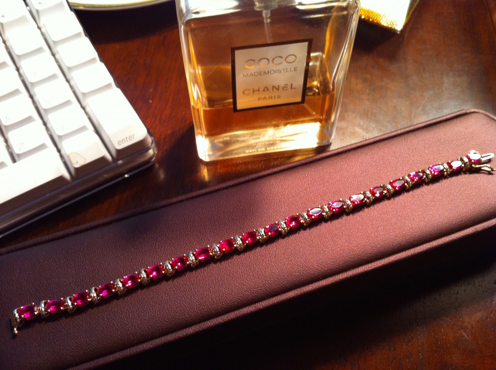 Diamond and Ruby Bracelet with Bottle of Coco Chanel Mademoiselle Perfume Diamond and Ruby Bracelet with Bottle of Coco Chanel Mademoiselle Perfume