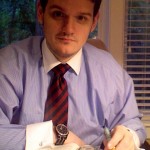 Joshua Kennon Reading in His Investing Office