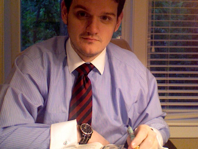 Joshua Kennon Reading in His Investing Office Joshua Kennon Reading in His Investing Office
