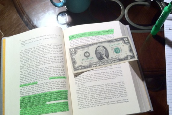 Reading Atlas Shrugged by Ayn Rand at Night Reading Atlas Shrugged by Ayn Rand at Night