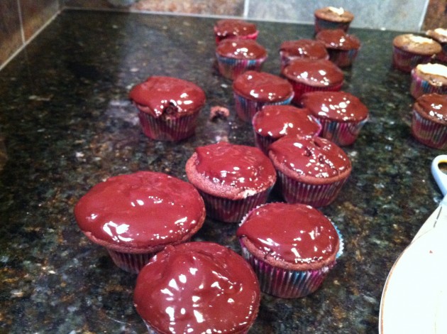 Dipping Peanut Butter Cupcakes in Chocolate