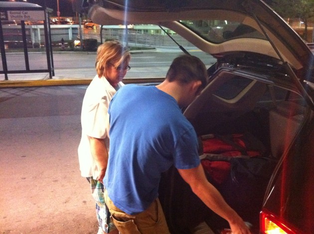 Mom and Aaron Unloading the Luggage at the Airport