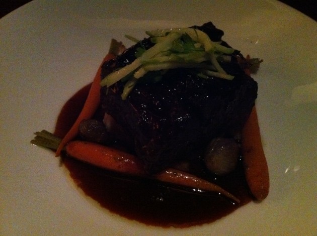 Jiko Braised Beef Short Rib with Truffled Potato Puree, Pearl Onions, Baby Carrots, and Cabernet-Tamarind Sauce