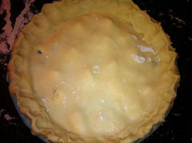 Putting on the Top Layer of Cherry Pie Before Smoothing and Fixing the Edges