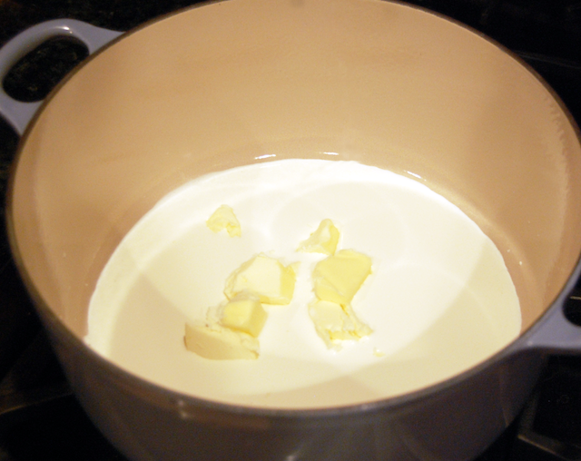 Adding Butter to Alfredo Sauce with Sun Dried Tomatoes and Chicken