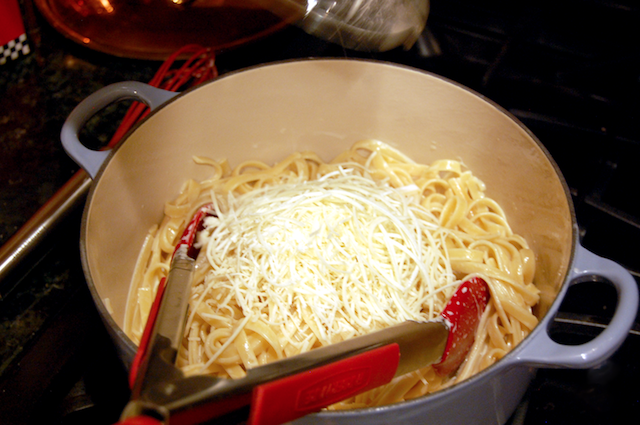 Adding Romano Cheese to the Alfredo Sauce