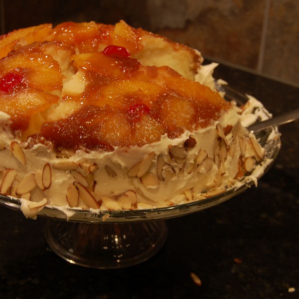 Frosted Almond Pineapple Upside Down Cake Stacked