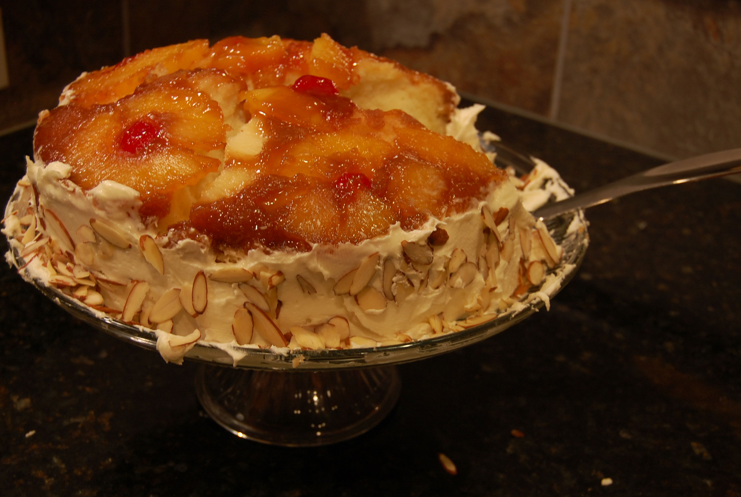 Frosted Almond Pineapple Upside Down Cake Stacked