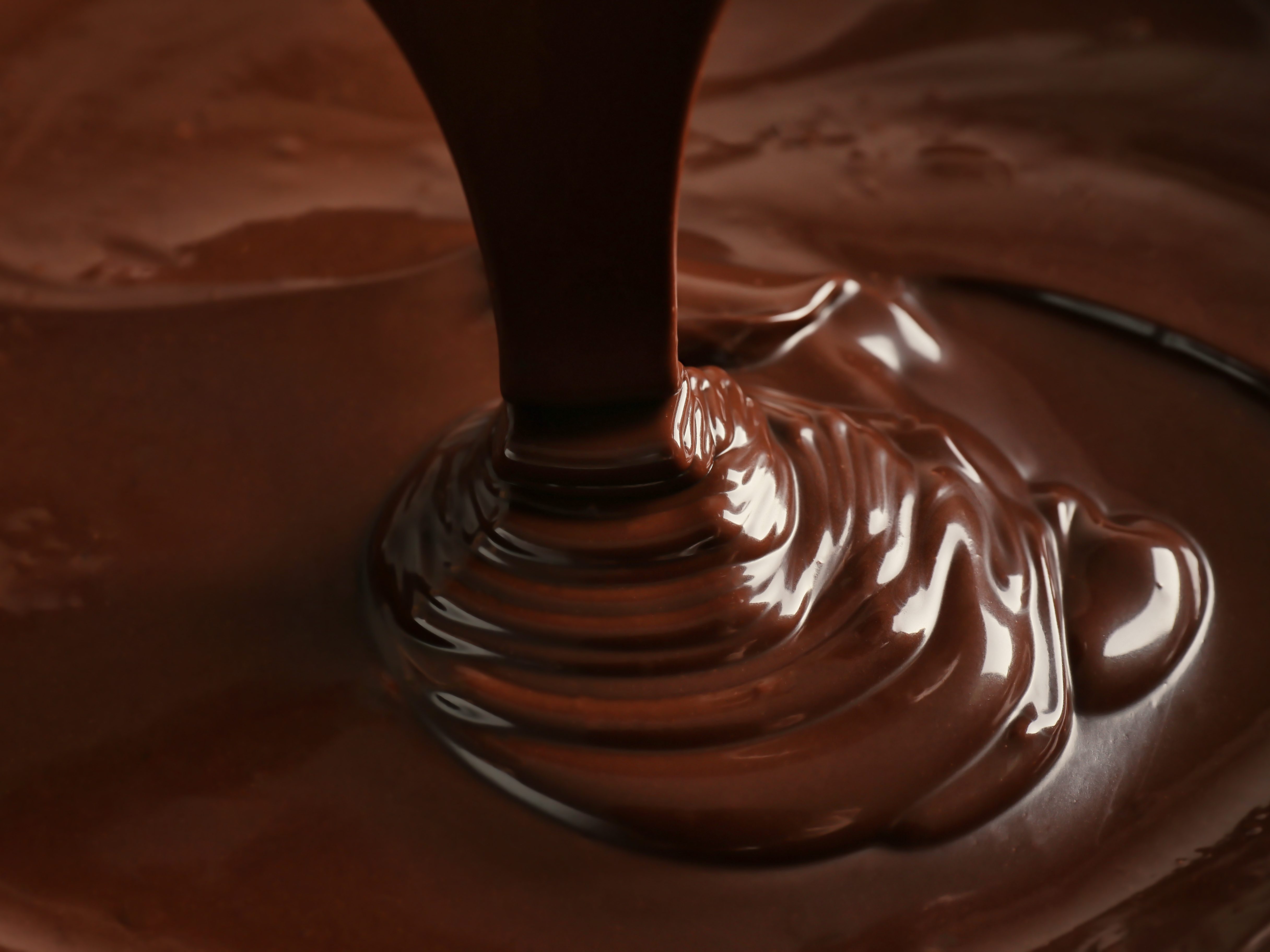 Melted chocolate background Melted chocolate background