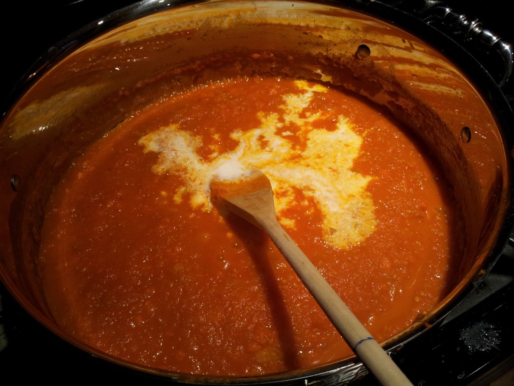Adding Heavy Cream to the Tomato and Cream Sauce