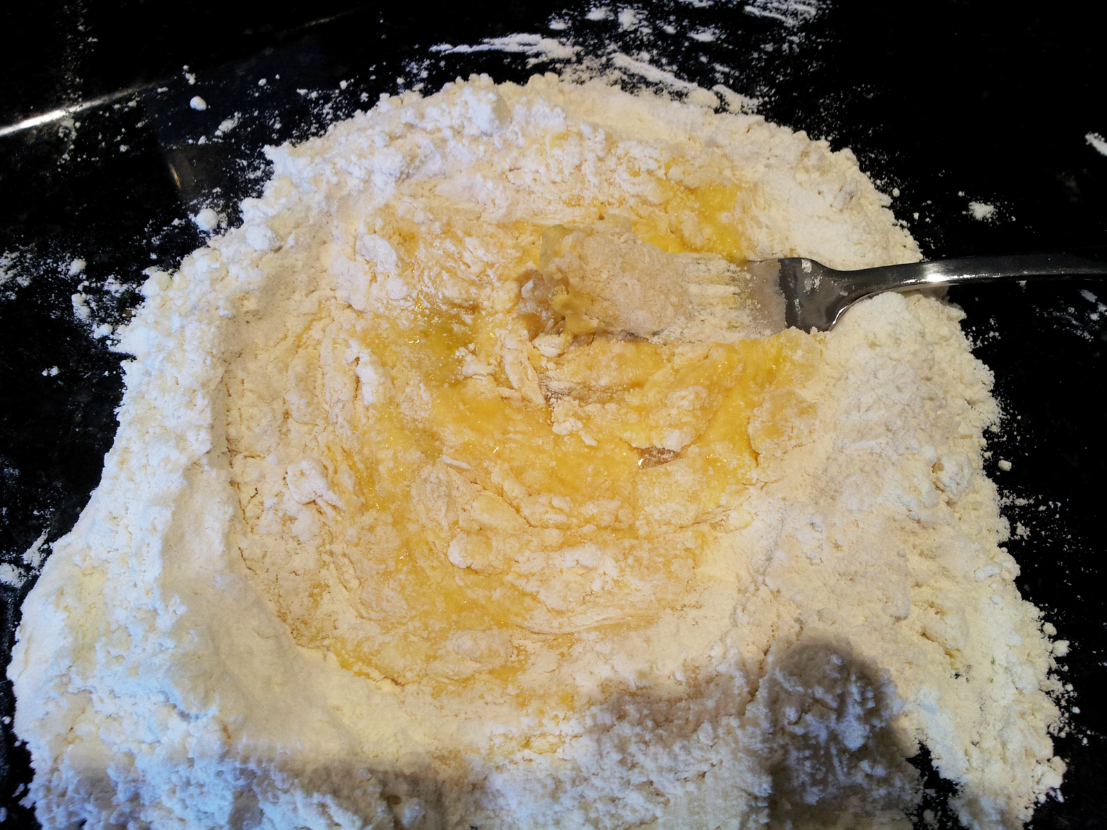 Homemade Fresh Pasta Step 3 - Mixing Flour Into Egg