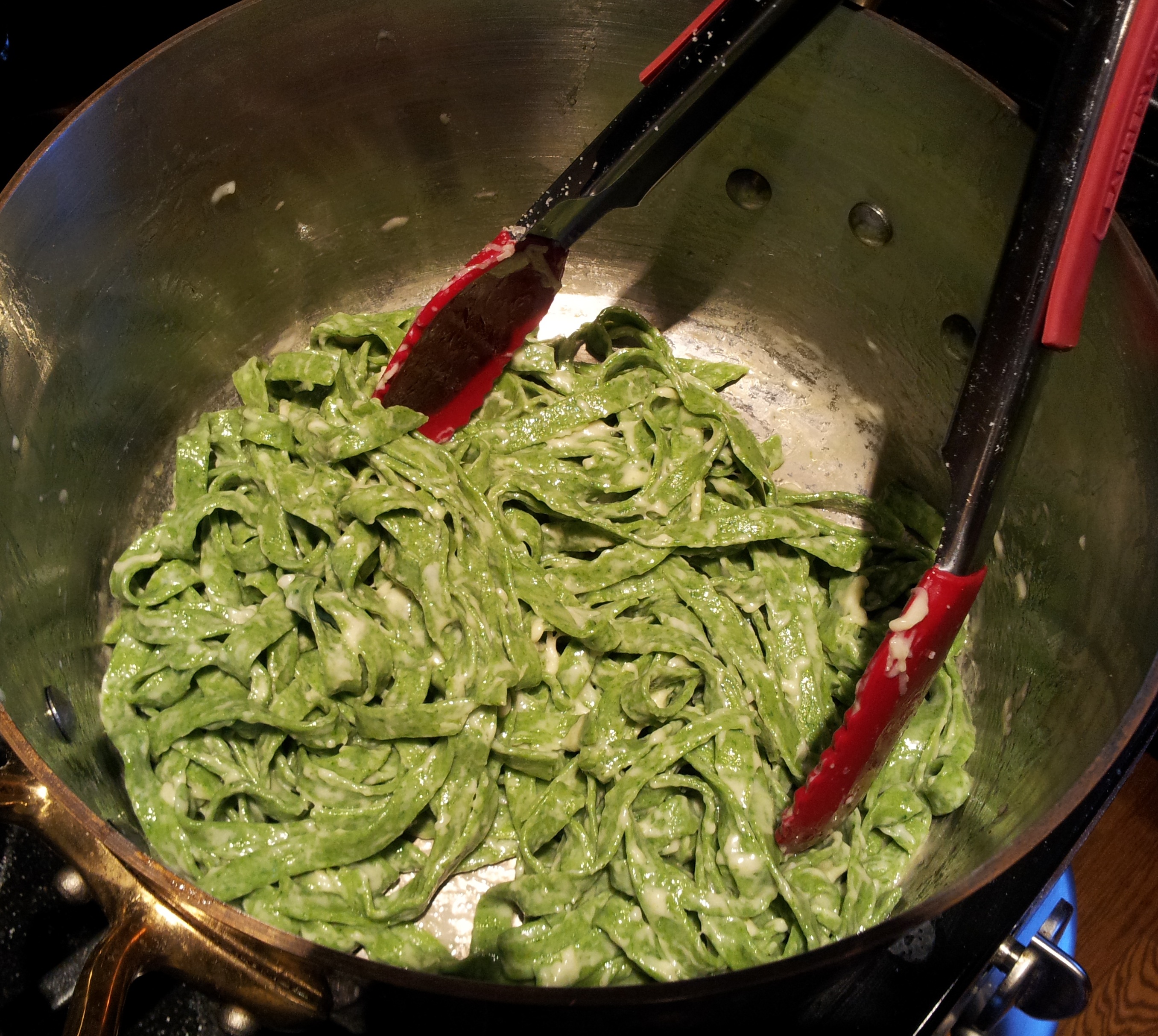 Tossing Spinach Fettuccine with Butter and Parmesan