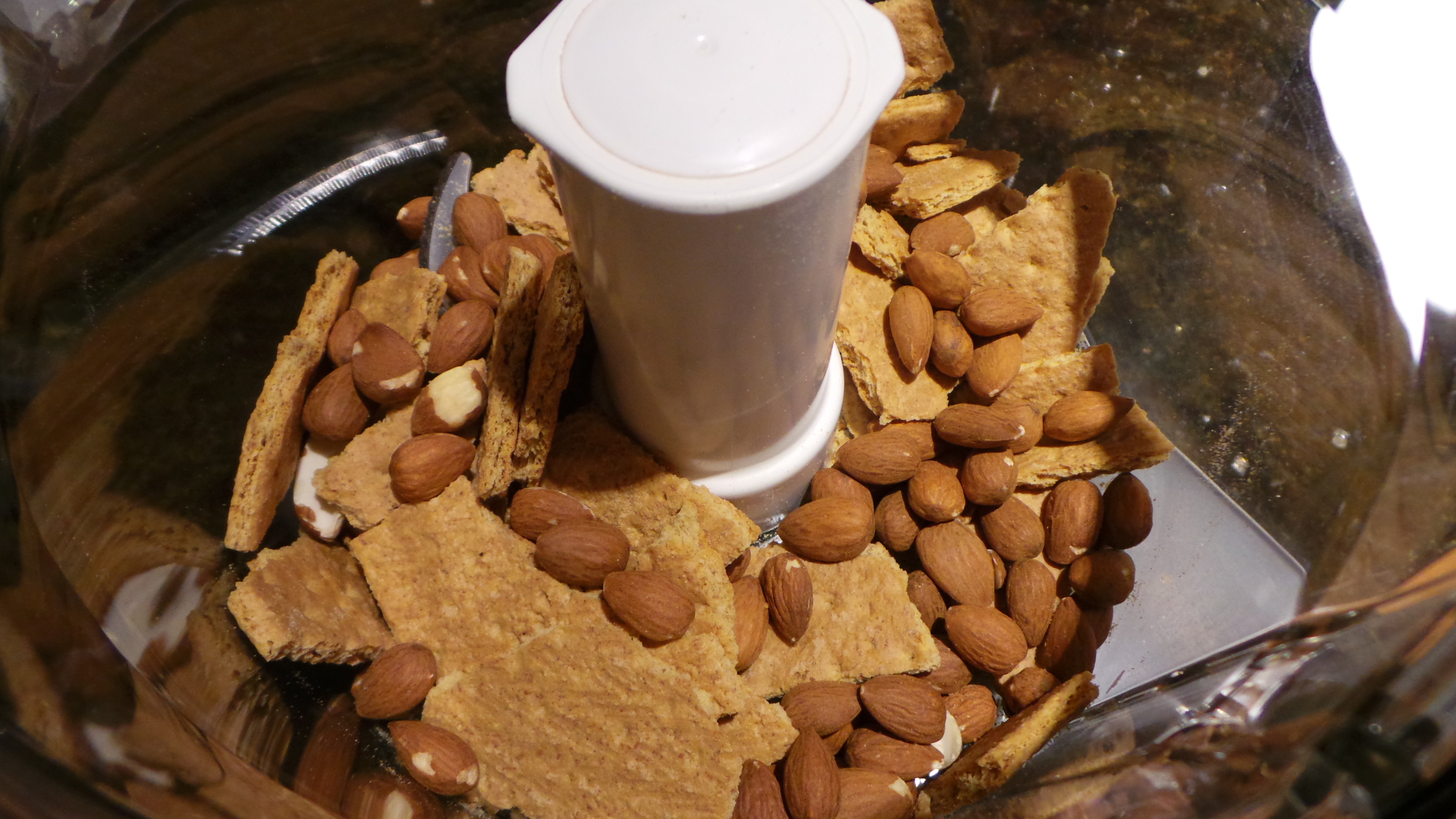 Almonds and Graham Crackers In Food Processor for Crust of Nectarine White Chocolate Cream Pie