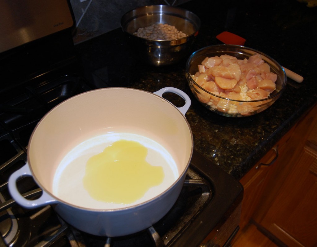 Heating Oil to Begin Cooking White Chicken Chili Recipe