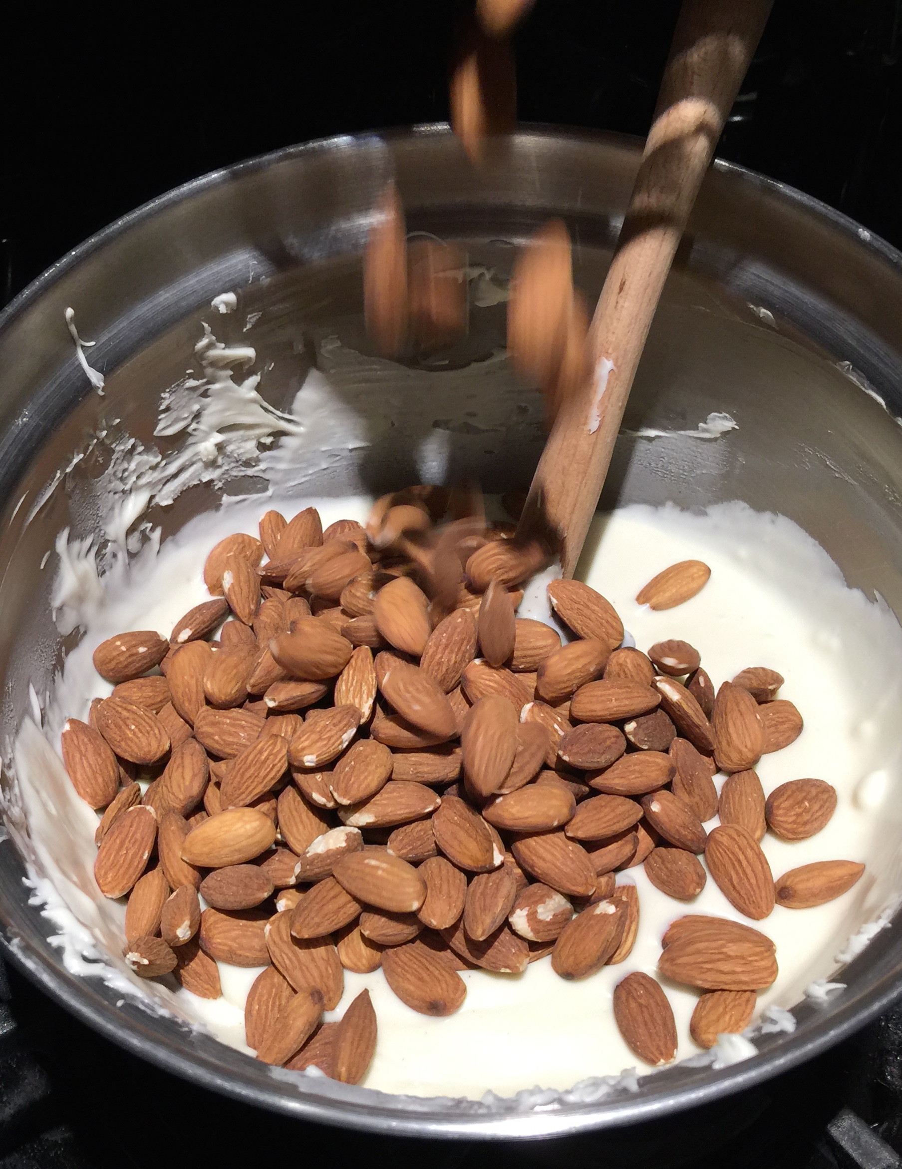 Adding Almonds to White Chocolate Clusters