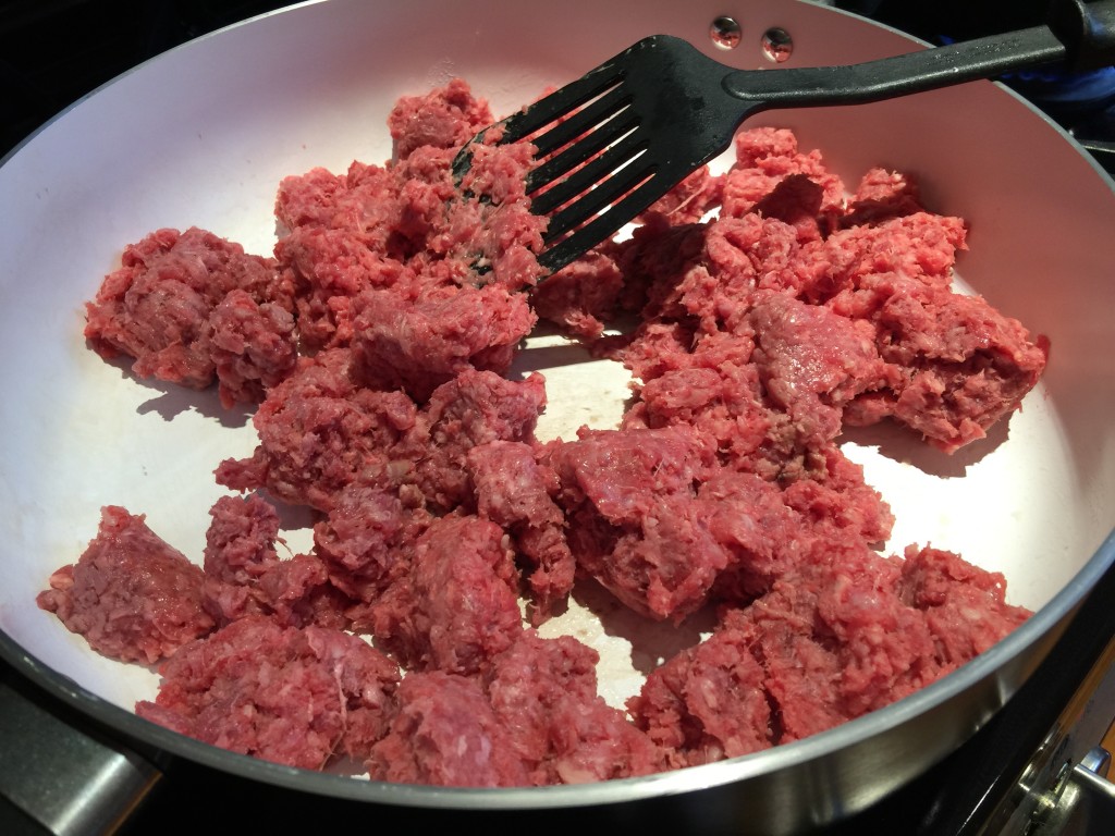 Brown two pounds of ground beef for the chili recipe