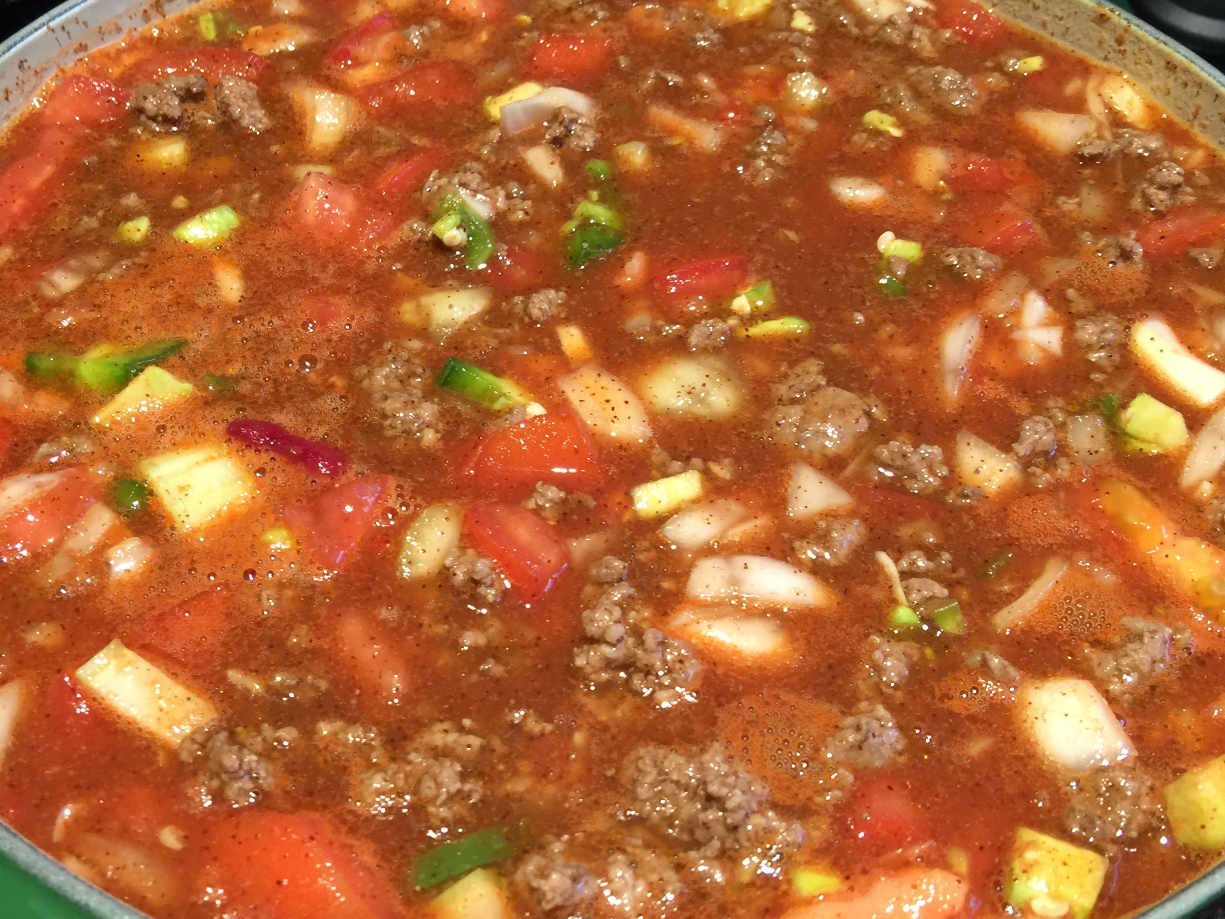 Stir the chili pot together and turn the heat up to medium Stir the chili pot together and turn the heat up to medium