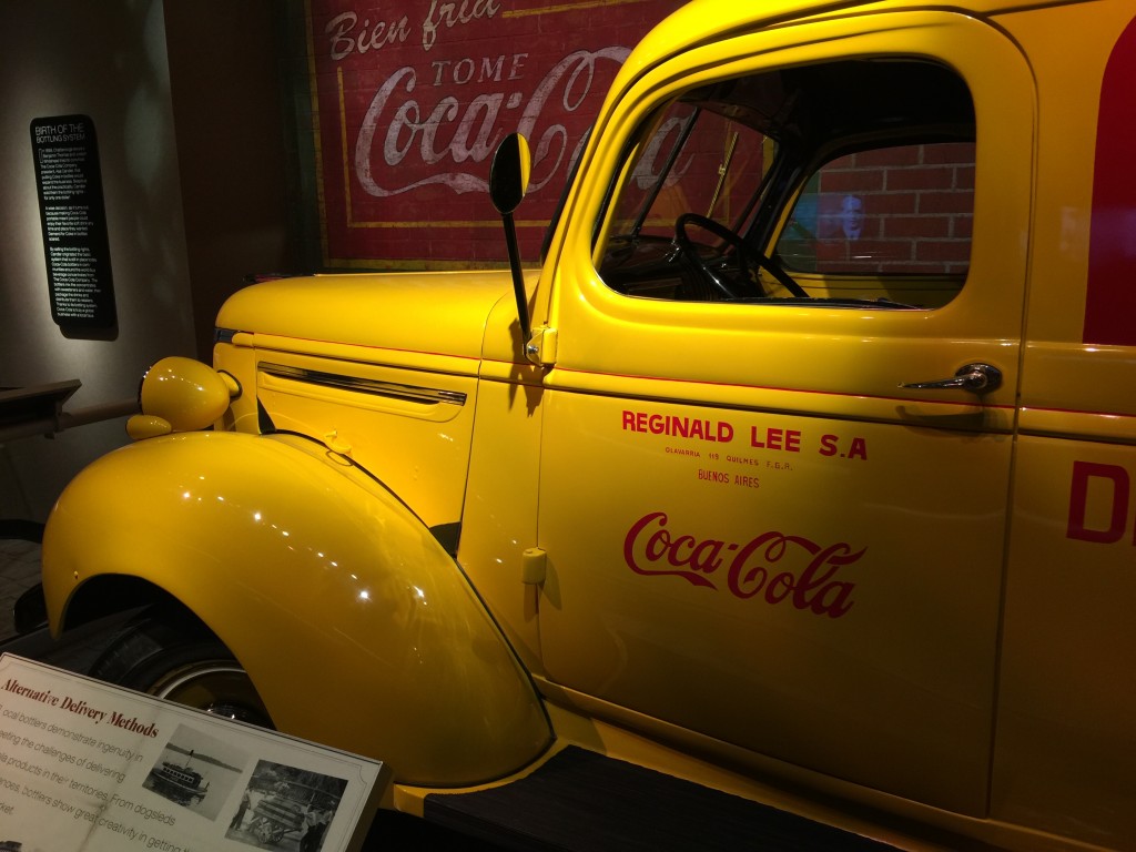 Yellow Coca-Cola Delivery Trucks