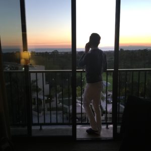 Aaron on the Phone with His Mom Looking Out Over the Ocean