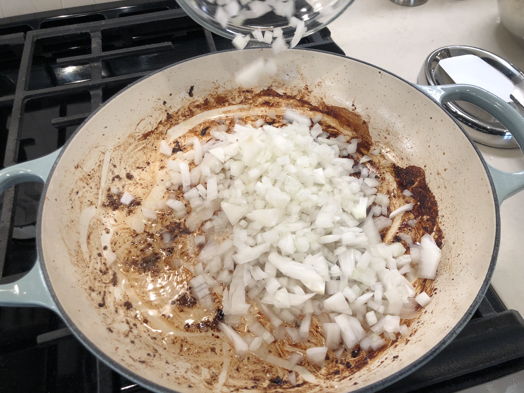 Add the Finely Chopped Onions to the Braiser - Beef Stroganoff Recipe