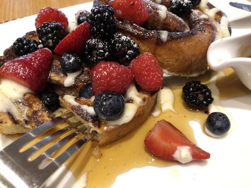 Oak Grill Newport Beach Cinnamon Roll French Toast with Fresh Berries After Syrup Oak Grill Newport Beach Cinnamon Roll French Toast with Fresh Berries After Syrup