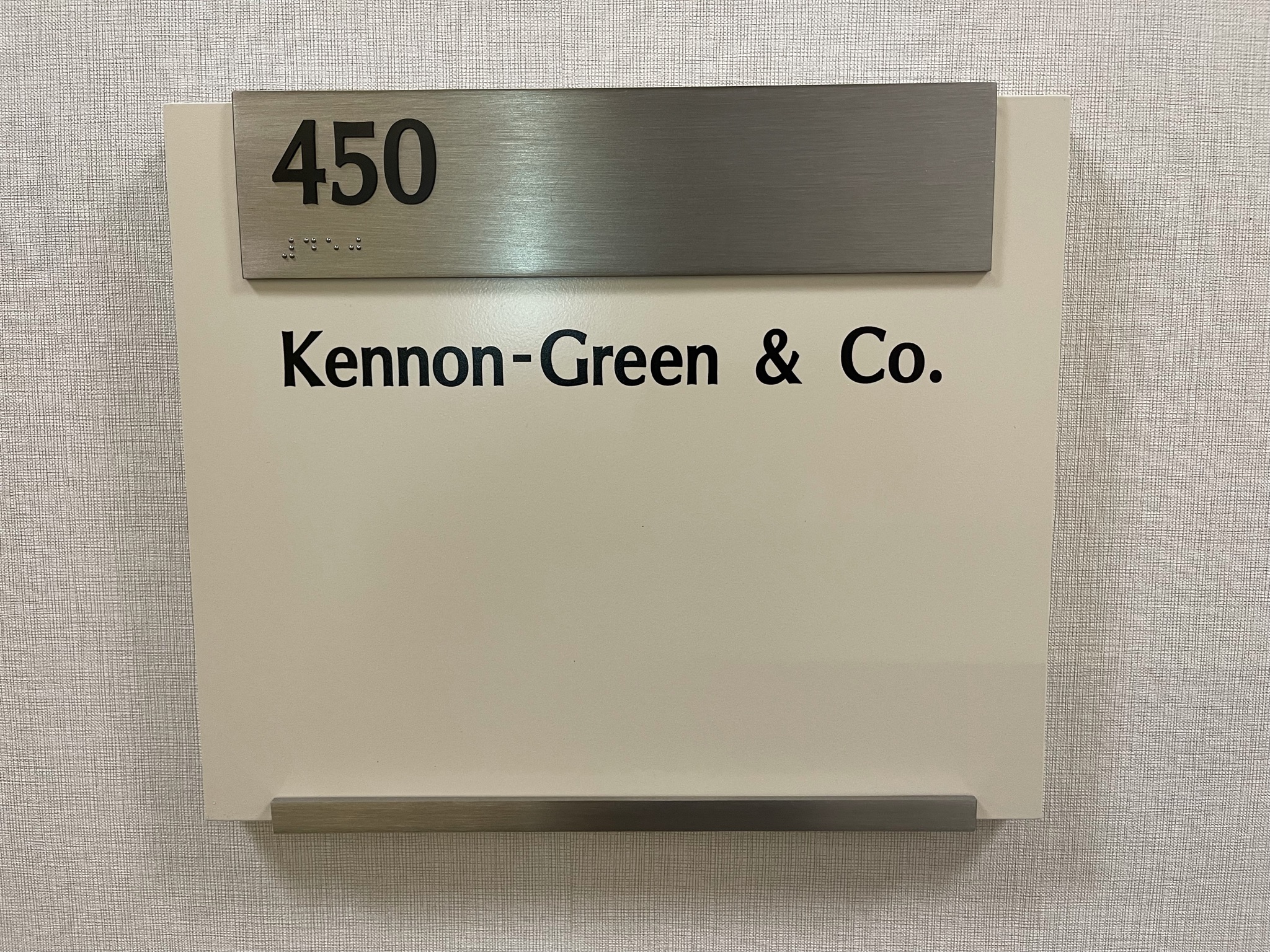 Official Nameplate of Kennon-Green & Co at 520 Newport Center Drive